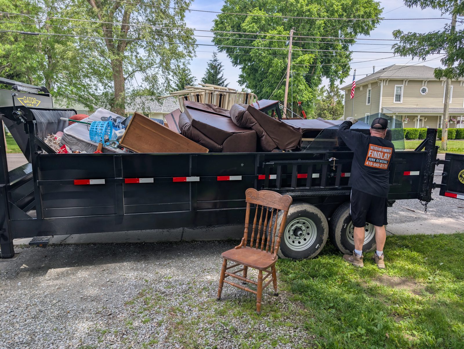 Full trailer loaded with furniture during a Findlay cleanout